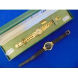 Two Gucci watches (5300 J & 3300 L), some wear on metal strap,