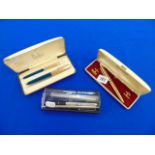 A boxed Parker pen set,