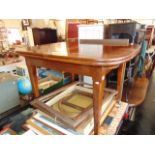 A Mahogany extending table