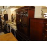 A Mahogany bookcase on cupboard base