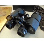 A pair of binoculars in case
