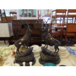 A pair of bronze Stags on bases