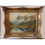 A large gilt framed oil on board, mountains,