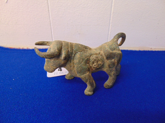 An eastern bronze Bull figure,