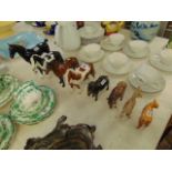 A collection of eight Beswick animal figures