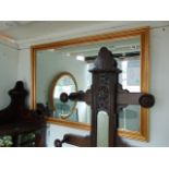 A gilt wall mirror