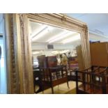 A large wall mirror 92 x 69