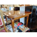 A Mahogany extending table