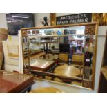 A rectangular gilt wall mirror