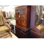 A Mahogany bookcase on cupboard base