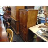 An Edwardian Oak cabinet,