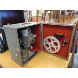 A cased Cine projector