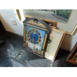 Four framed pictures and a jigsaw puzzle clock