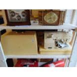 A Toyota electric sewing machine inc carry case,