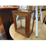 A small table top display cabinet