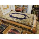 A Persian Ghom Silk carpet, Dark blue and Gold pattern, approx,