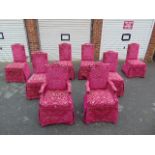 A Set of Eight red/ Silver upholstered dining chairs,