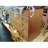 A mid century five drawer chest