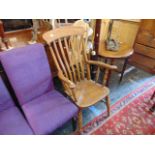 A Windsor slat back elbow chair