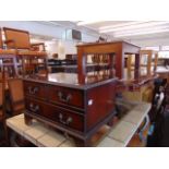 A wooden coffee table with small cabinet