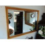 A gilt wall mirror