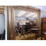 A large wall mirror 92 x 69