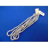 Three Grey pearl necklaces, 40cm,