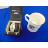 An Elvis watch boxed and tankard