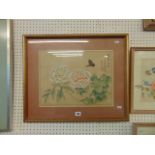 A framed oriental silk panel