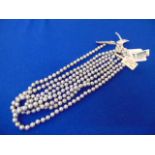 Four Grey pearl necklaces,