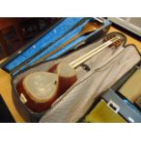 A Persian Tar instruments inc case a.