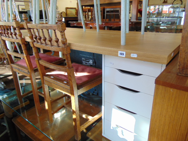 A contemporary single pedestal desk