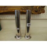 A pair of silver plated candlesticks