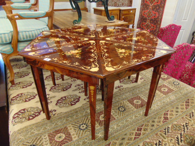 An Italian marquetry musical hexagonal shaped six piece triangle tables,