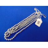 Three Grey pearl necklaces, 40cm,