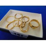 Eight pieces of assorted jewellery, Yellow metal ring, earrings,