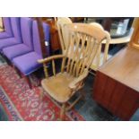 A Windsor slat back elbow chair