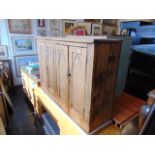 A Pine Gothic style cabinet with one interior drawer, a.