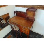 An Edwardian single pedestal desk and a single chair