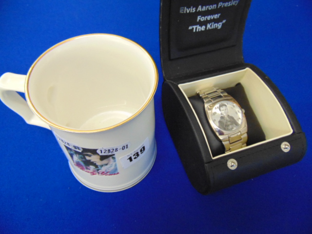 An Elvis watch boxed and tankard