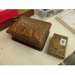 A carved box and metal lidded box