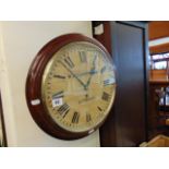 A Mahogany wall clock by Betsworth and Son,