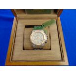 A stainless steel designer style watch boxed