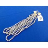 Four Grey pearl necklaces,