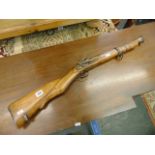 An antique Flintlock short rifle