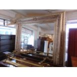 A large wall mirror 92 x 69