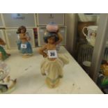 A boxed Lladro figure of a girl,