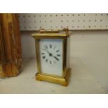 A French brass carriage clock,
