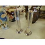 A pair of silver plated candlesticks