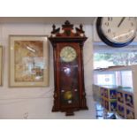 A mahogany regulator clock